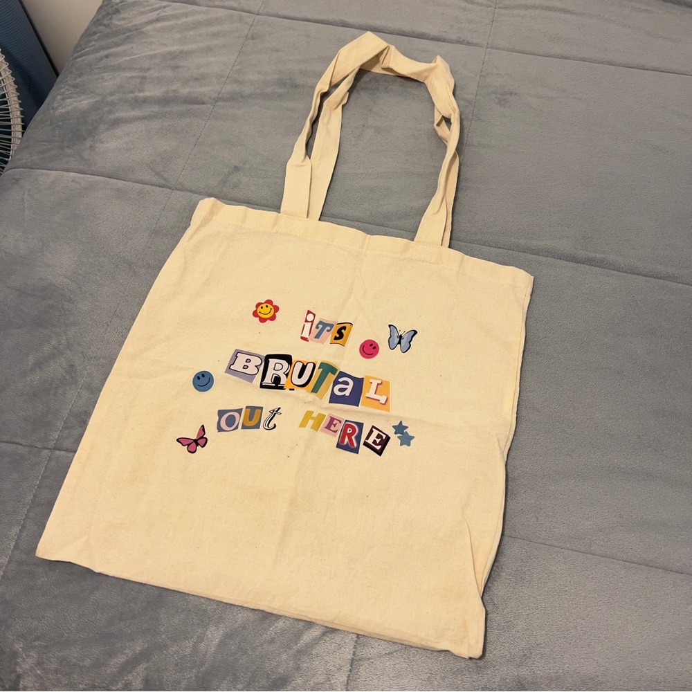 It’s brutal out here tote bag